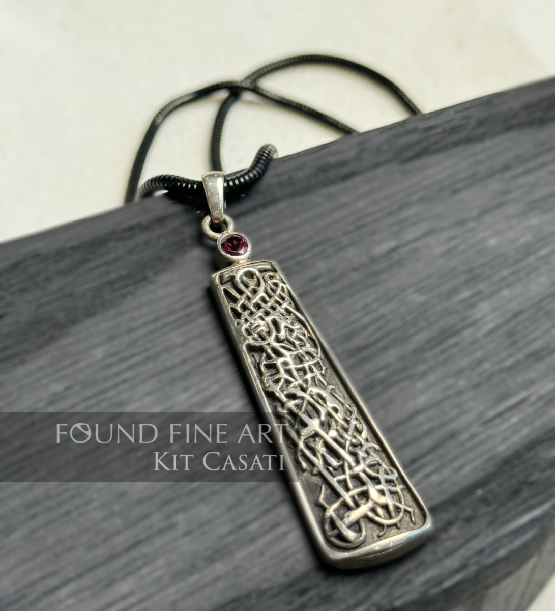 Celtic-inspired silver pendant